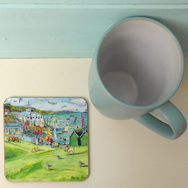 coaster printed with a fun green scene with beach huts and sea set on Isle of Wight