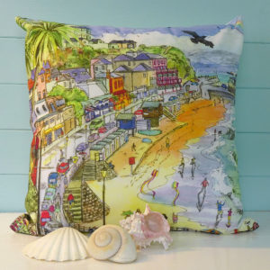 Ventnor beach scene with rainbow printed on a cushion on isle of wight