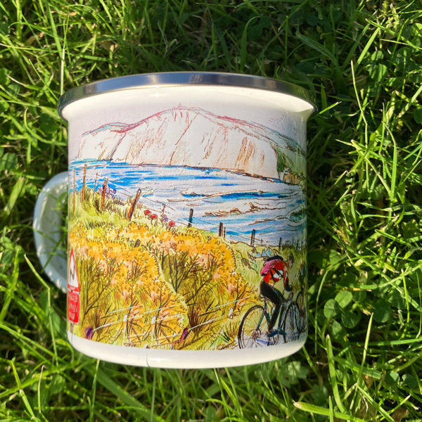 enamel mug featuring cyclists at compton on the isla of wight
