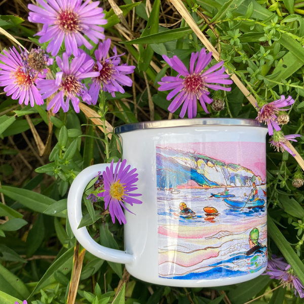 enamel mug featuring sea swimmer swimming across the solent and the needles in the background